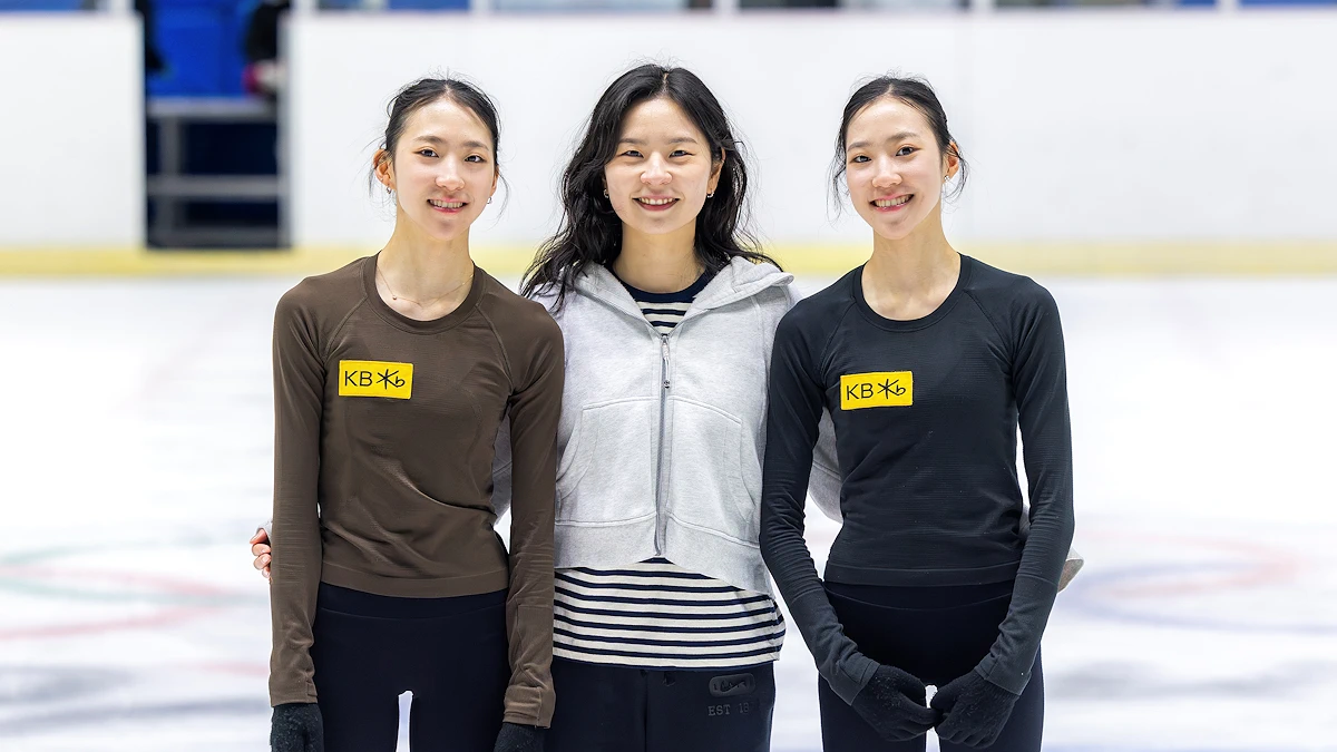 Yuseong Kim and sister Yujae Kim with coach Nahyun Kim at the Taereung International Skating Rink